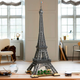 The Lego Eiffel Tower fully assembled sitting on a table.